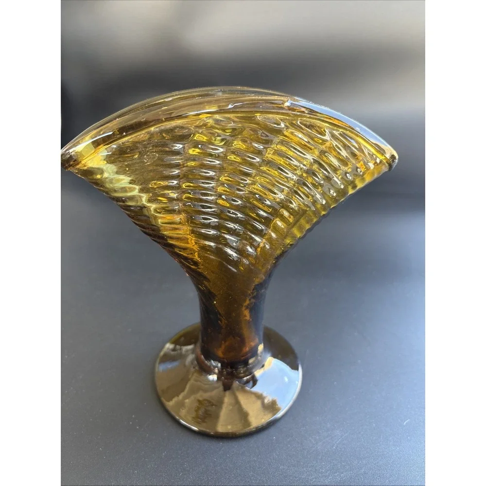 Mid-Century Modern Amber Glass Fan Vase featuring an optic ribbed pattern.